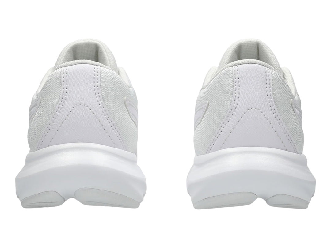 Tenis deportivos ASICS para niños en color blanco total con malla transpirable y suela blanca.