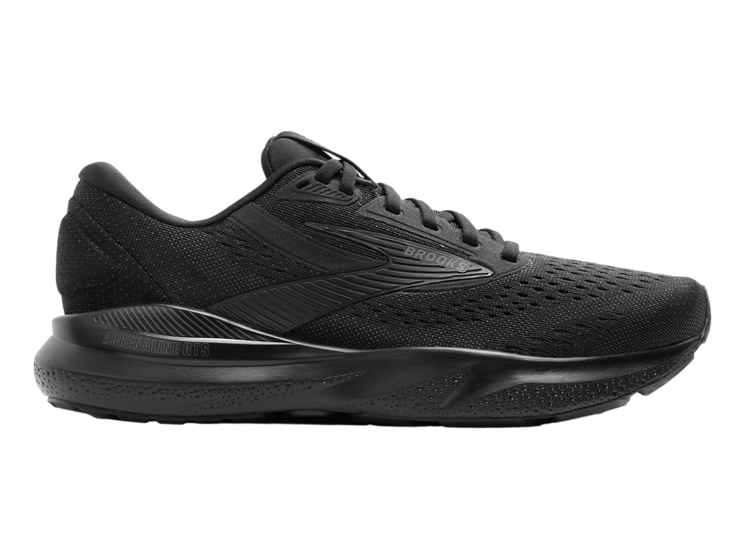 Zapato deportivo Brooks Adrenaline GTS 24 en color negro total con malla transpirable y suela amortiguada.