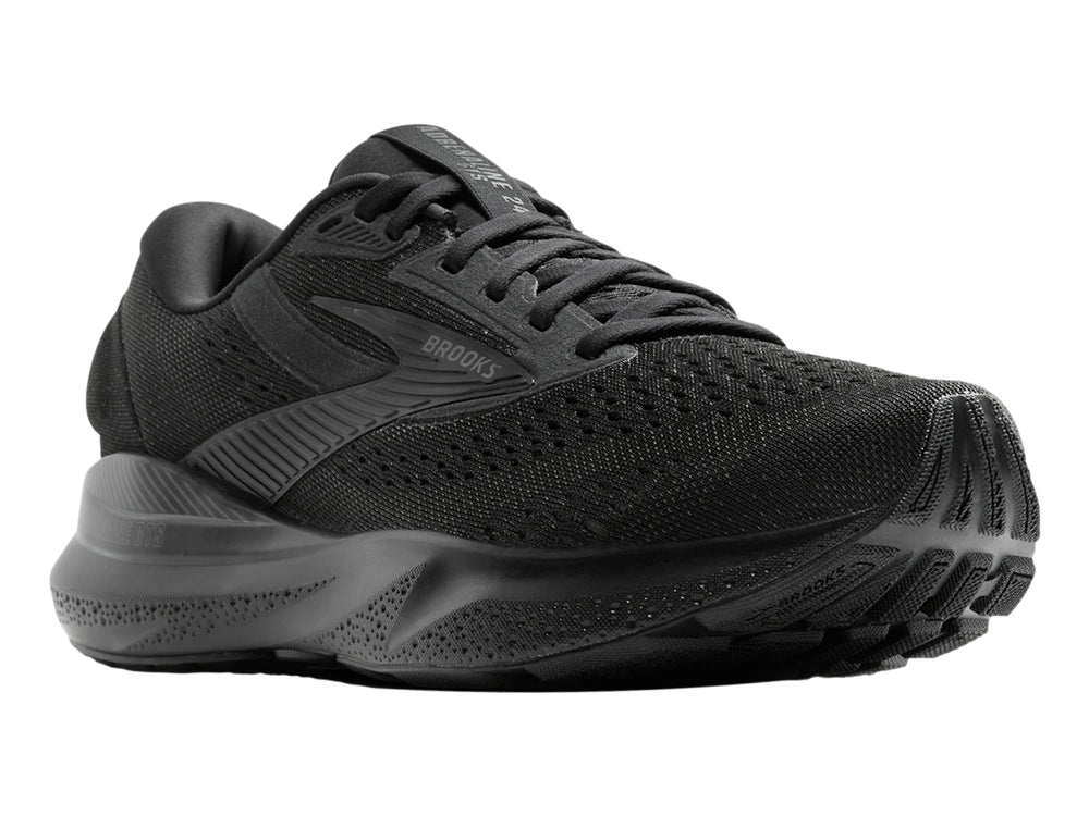 Zapato deportivo Brooks Adrenaline GTS 24 en color negro total con malla transpirable y suela amortiguada.