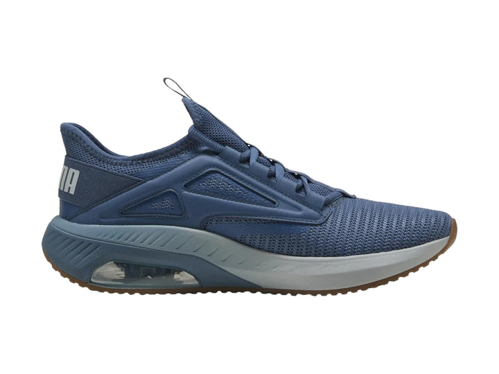 Tenis deportivos PUMA X-Cell Ayro en color azul oscuro con detalles en gris y suela marrón.