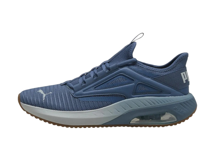 Tenis deportivos PUMA X-Cell Ayro en color azul oscuro con detalles en gris y suela marrón.
