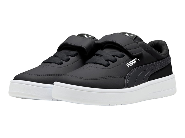 Tenis PUMA negros para Niño con suela blanca, cierre de velcro y agujetas.
