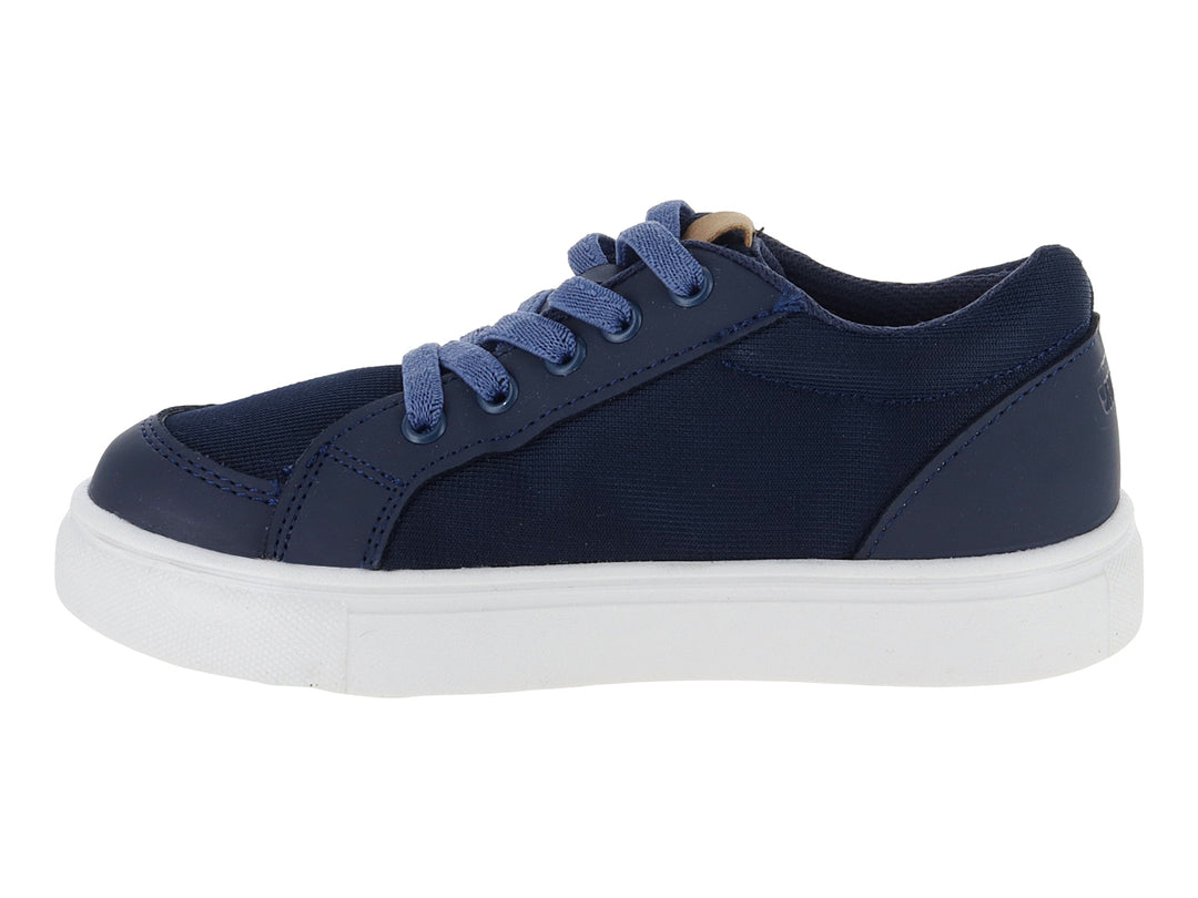 Tenis infantiles color azul marino con franja blanca y suela blanca.