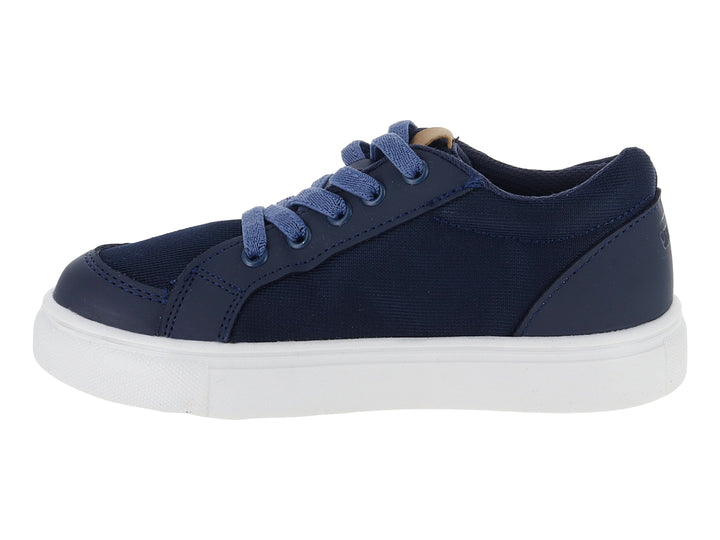 Tenis infantiles color azul marino con franja blanca y suela blanca.