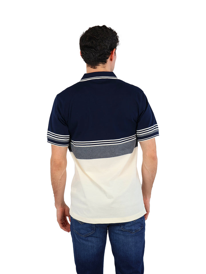 Playera polo para hombre Palm Beach en colores navy, gris y crema con diseño de bloques de color.