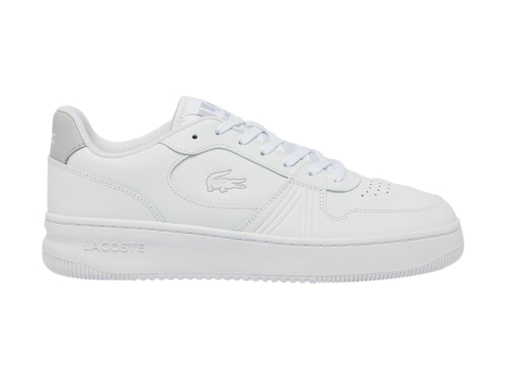 Tenis Lacoste blancos de corte bajo con talón gris y suela blanca.