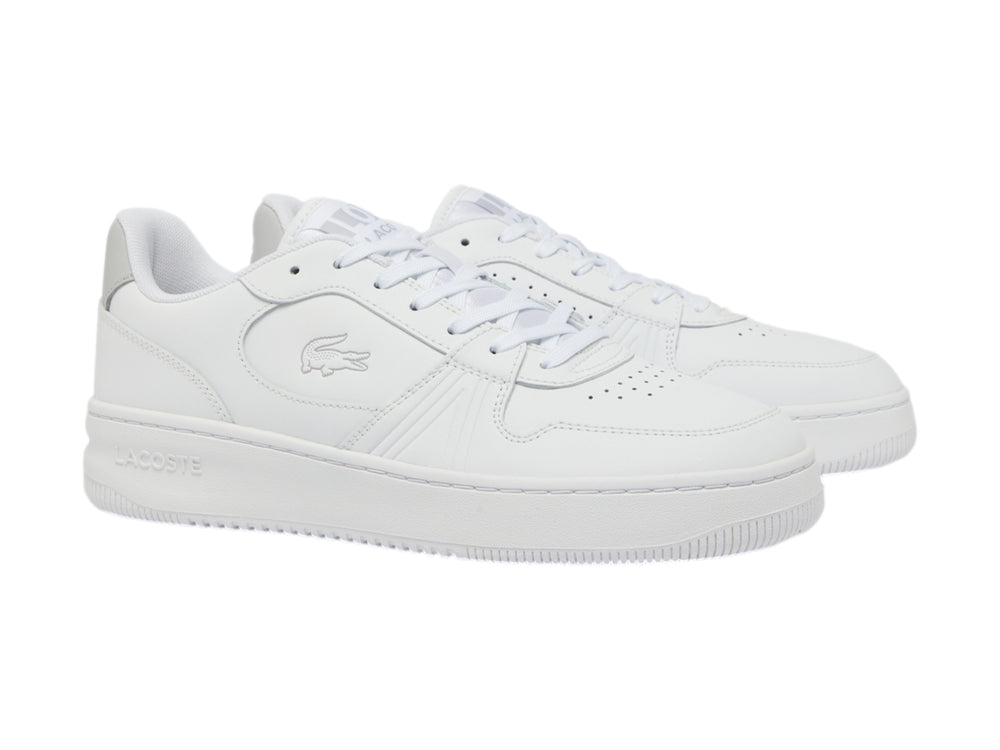 Tenis Lacoste blancos de corte bajo con talón gris y suela blanca.