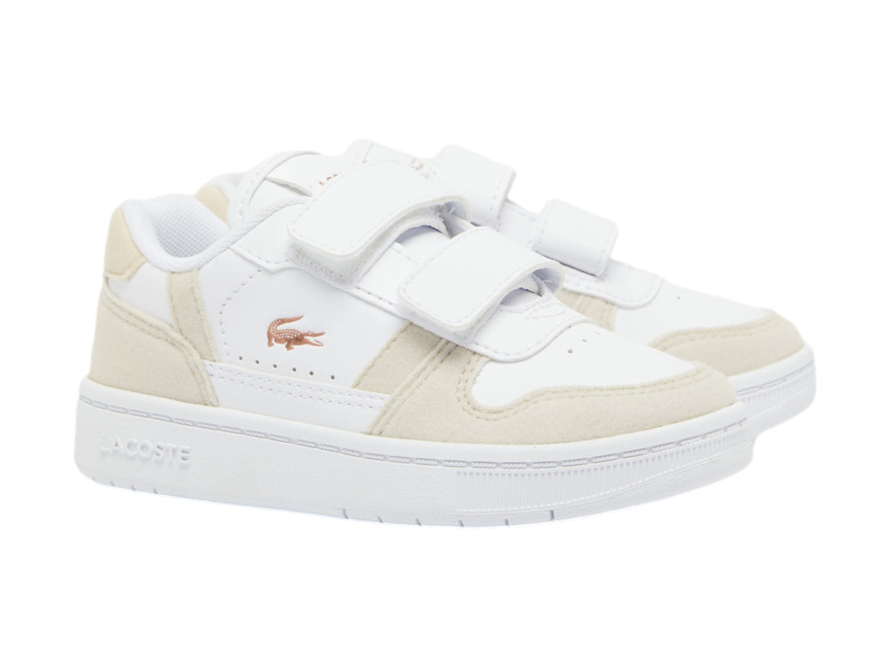 Tenis blancos con detalles en rosa claro y cierre de velcro de la marca Lacoste.