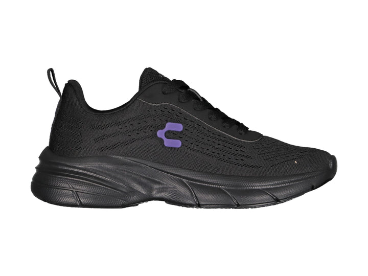 Tenis deportivos Charly color negro con detalle en morado y suela robusta.