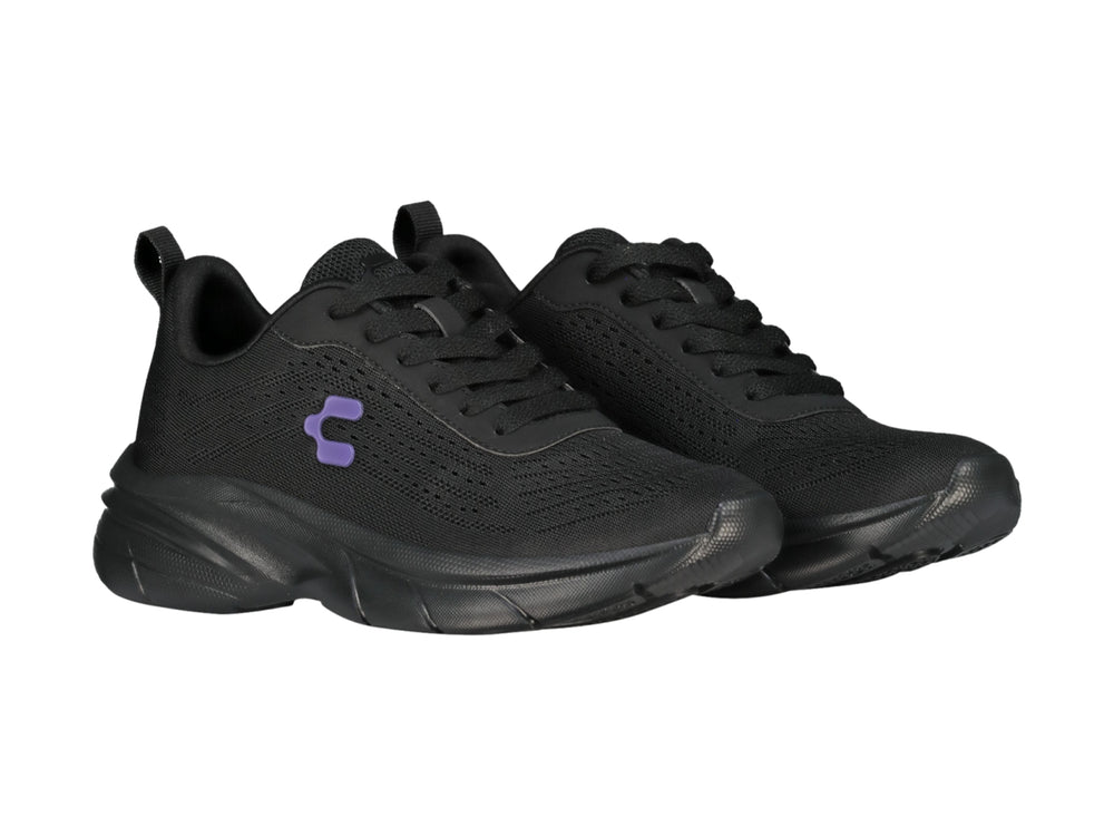 Tenis deportivos Charly color negro con detalle en morado y suela robusta.