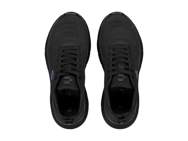 Tenis deportivos Charly color negro con detalle en morado y suela robusta.