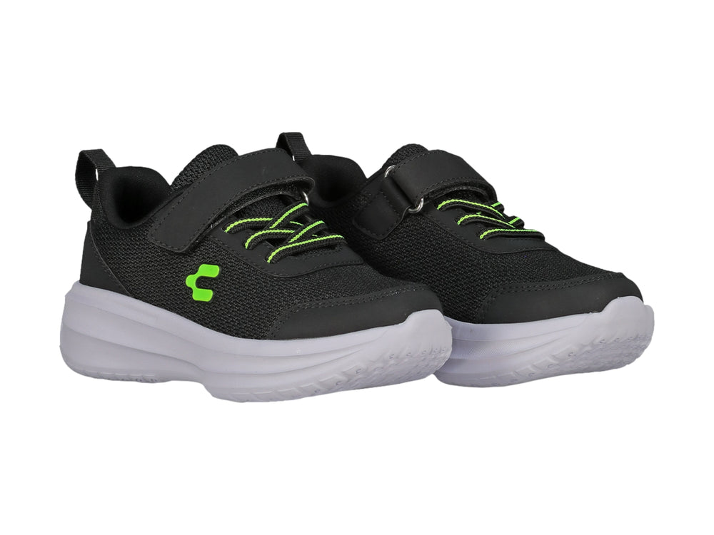 Tenis Charly color negro con suela blanca, cierre de velcro y detalles en verde neón para niño.