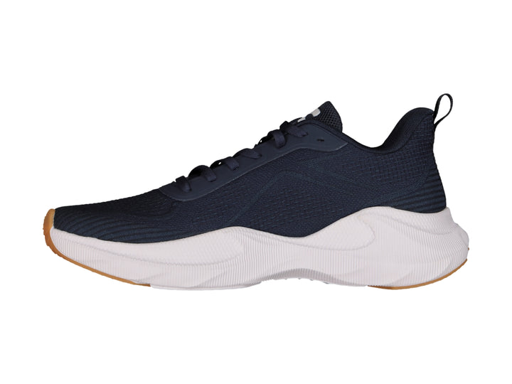 Tenis deportivos Charly en color negro con suela blanca y detalles en miel, diseño ligero para deporte.