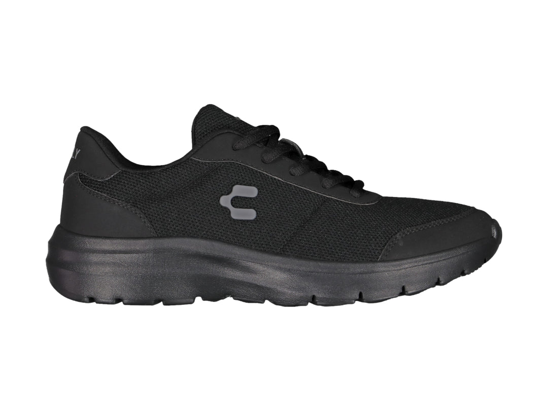 Tenis casuales Charly color negro con suela gruesa y tejido transpirable.
