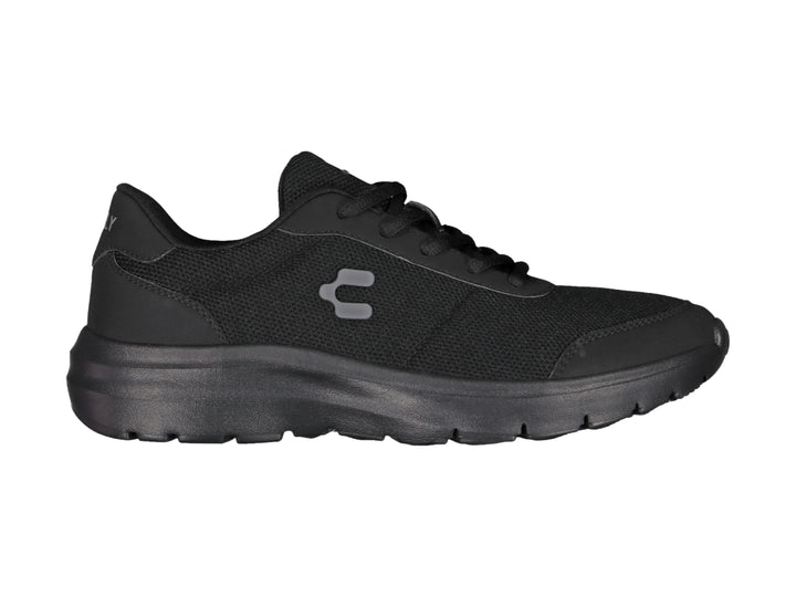 Tenis casuales Charly color negro con suela gruesa y tejido transpirable.