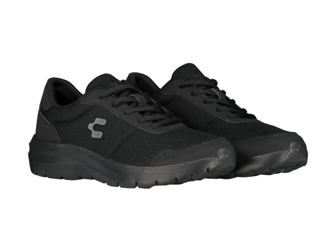 Tenis casuales Charly color negro con suela gruesa y tejido transpirable.
