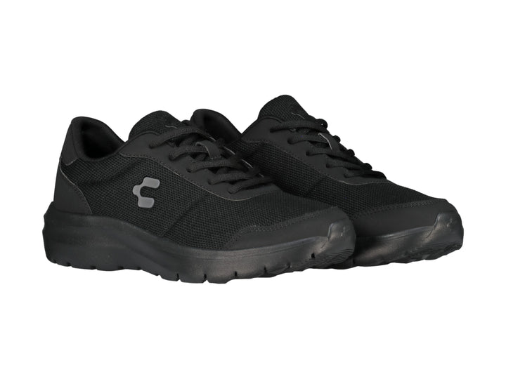 Tenis casuales Charly color negro con suela gruesa y tejido transpirable.