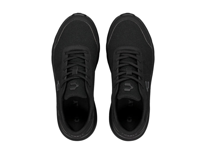 Tenis casuales Charly color negro con suela gruesa y tejido transpirable.