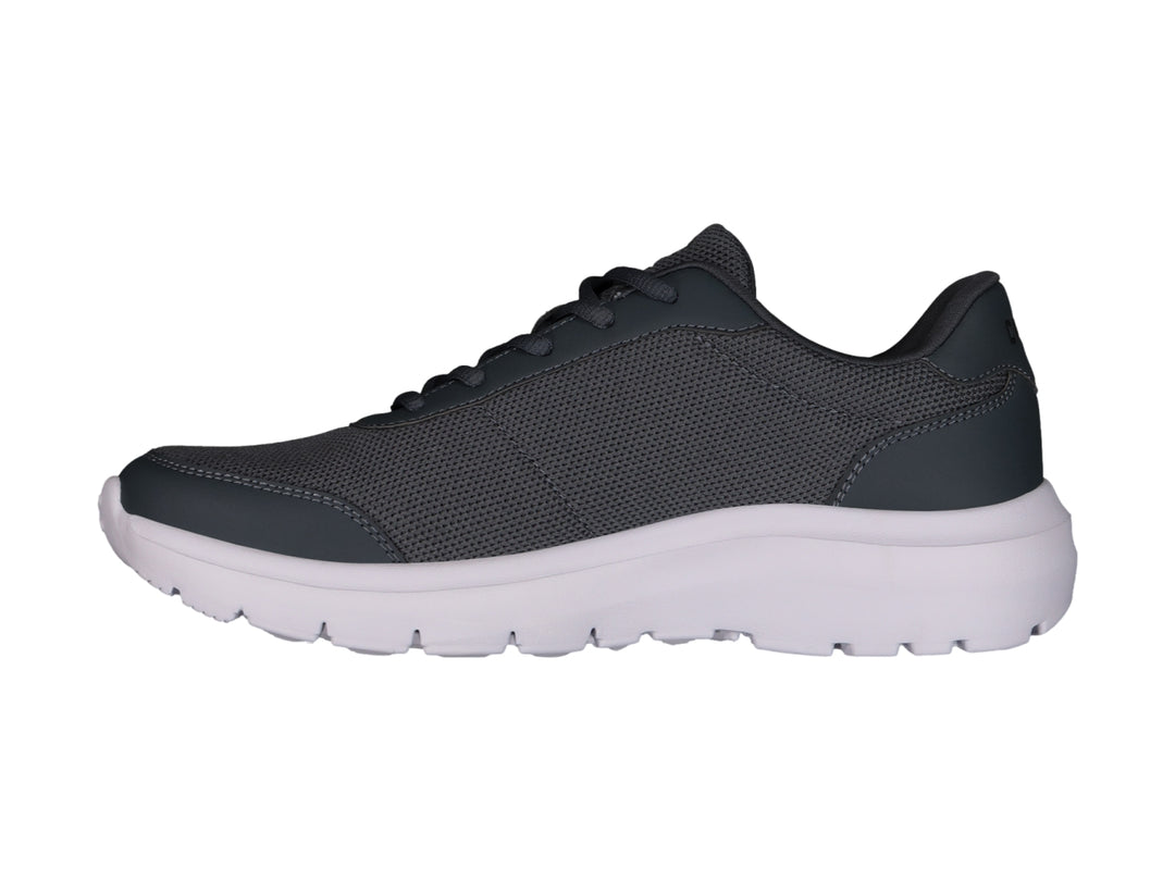 Tenis casuales Charly color gris con suela blanca y tejido de malla.