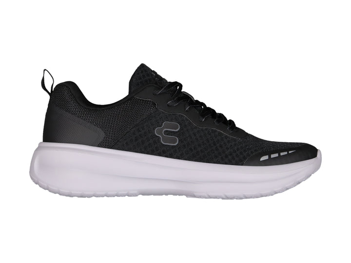 Tenis Charly Road Casual en color negro con suela blanca y tejido transpirable.