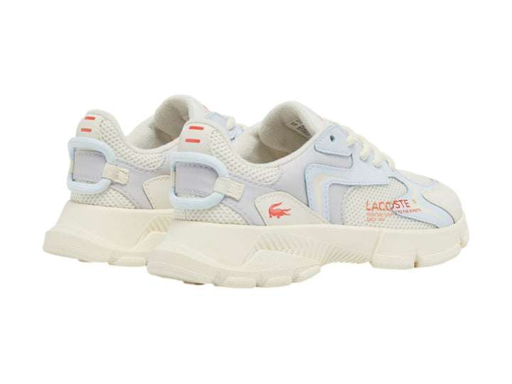 Tenis deportivos Lacoste en colores blanco roto y gris claro con suela gruesa y detalles en malla.