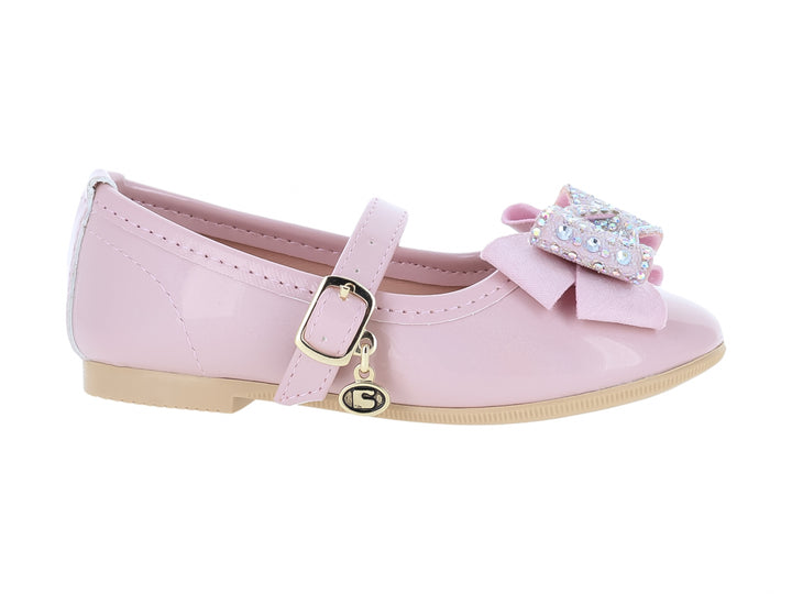 Zapato rosa tipo Mary Jane para niña con moño decorado con brillantes y correa con hebilla dorada.