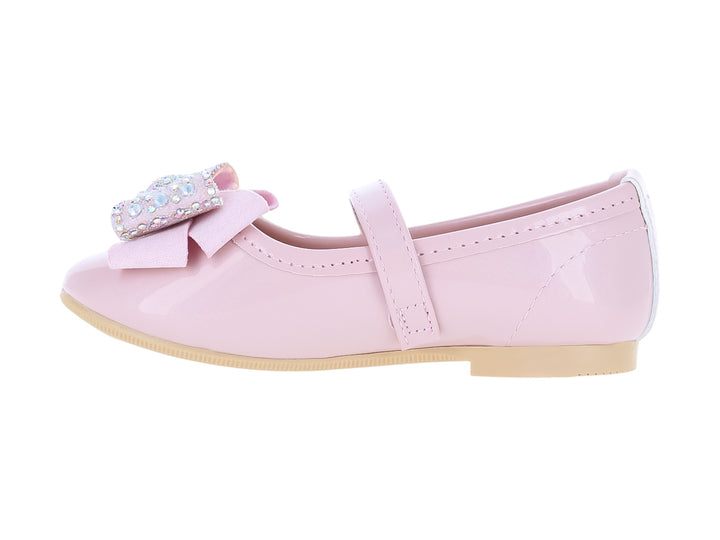 Zapato rosa tipo Mary Jane para niña con moño decorado con brillantes y correa con hebilla dorada.