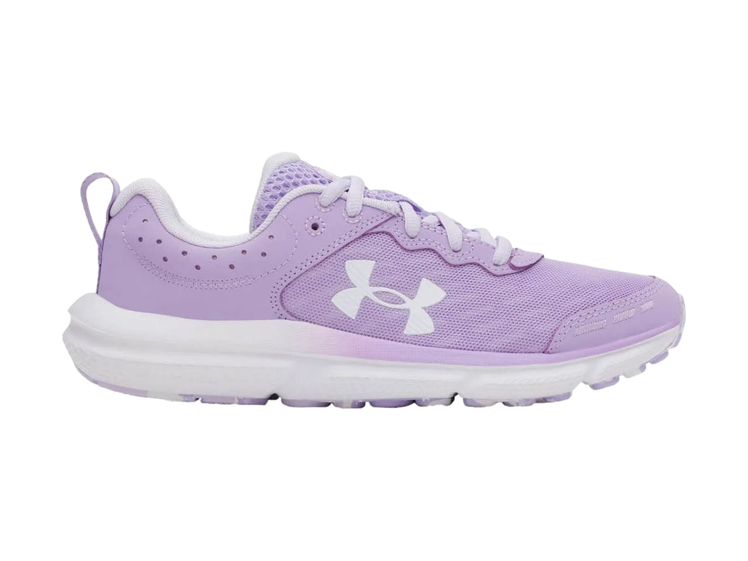 Tenis deportivos Under Armour de color morado con suela blanca y logotipo blanco lateral.