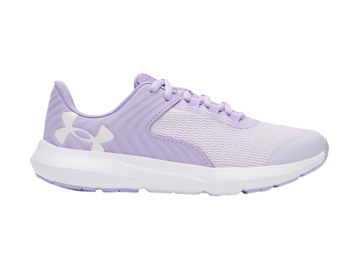 Tenis deportivos Under Armour de color morado con suela blanca y detalles en malla.