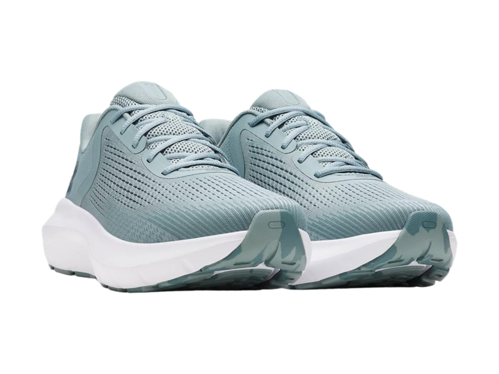 Tenis deportivos Under Armour Charged Rogue 5 en color verde con suela blanca.