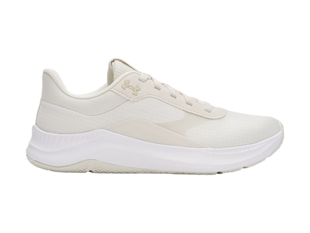 Tenis deportivos Under Armour color blanco con suela blanca y diseño minimalista.