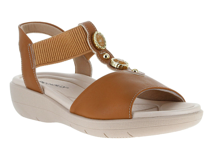 Sandalia Piccadilly color marrón con suela beige y detalles dorados.