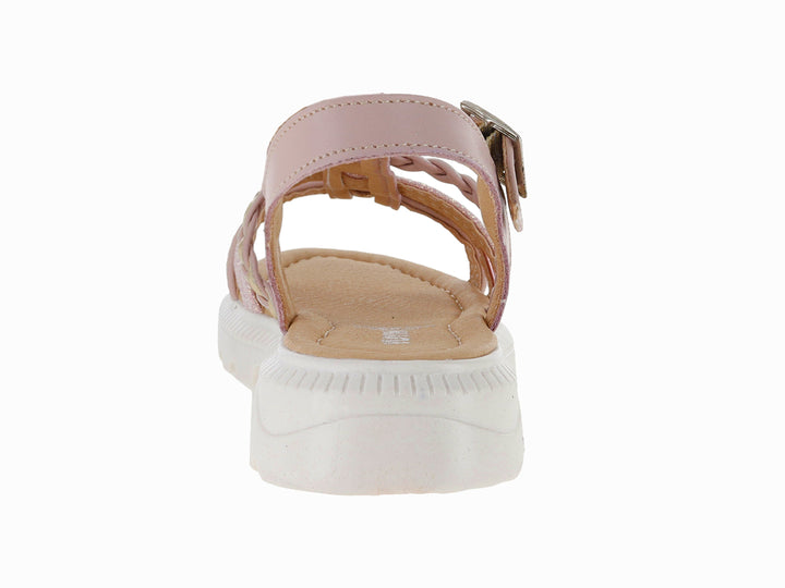 Sandalia infantil rosa con suela blanca, tiras brillantes y detalle trenzado.
