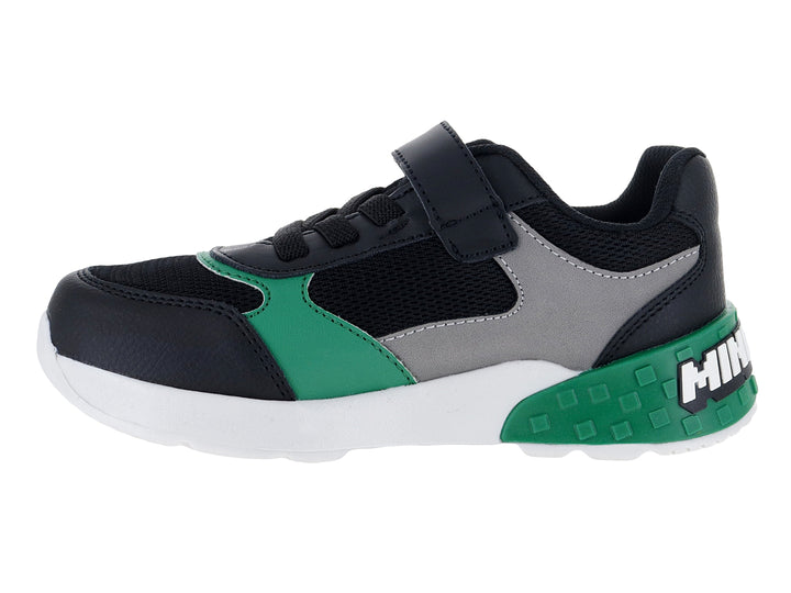 Tenis deportivos para niño color negro y verde con temática de Minecraft y suela blanca.