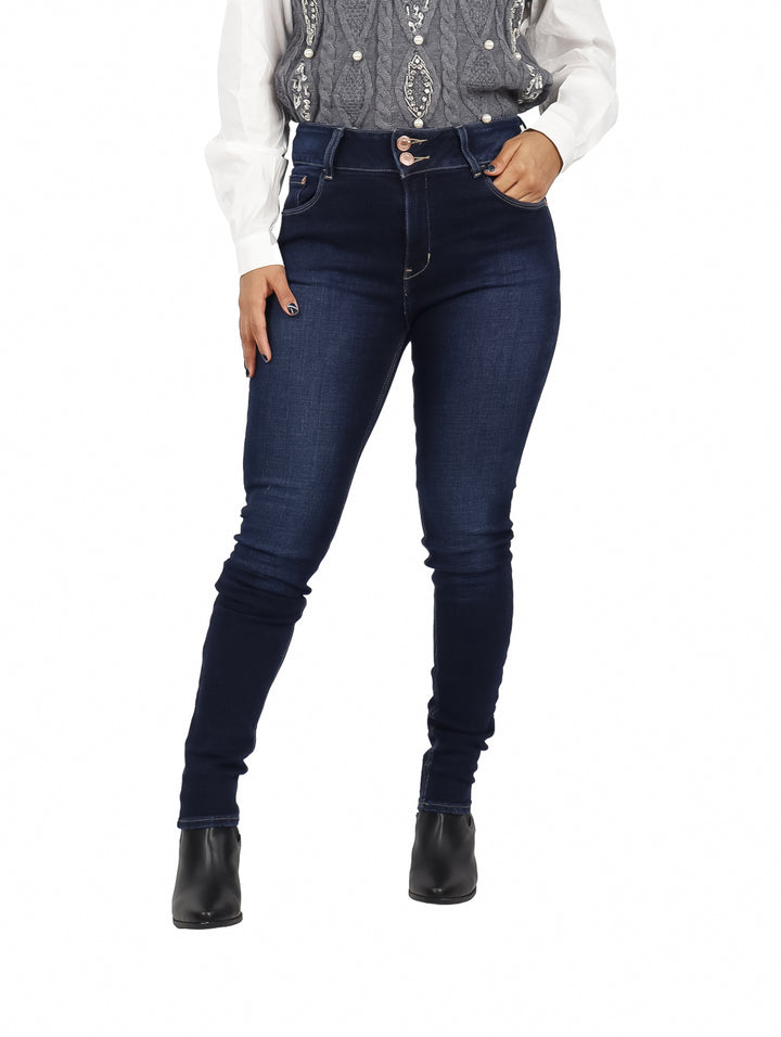 Pantalones jeans ajustados color azul oscuro con efecto lavado stone.