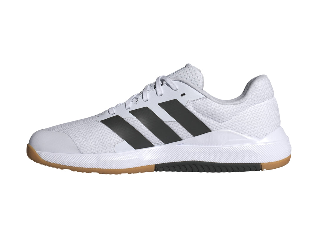 Tenis deportivos Adidas DropSet Base color blanco con franjas negras y suela de goma color café.