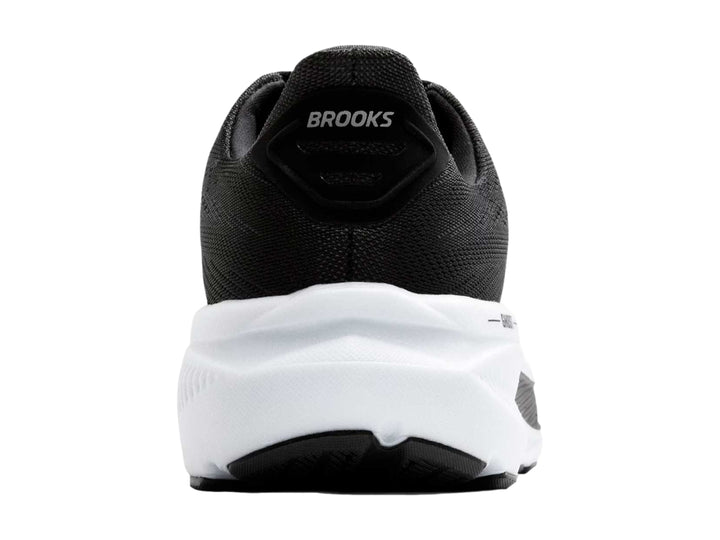 Tenis deportivos Brooks Ghost 17 color negro con suela blanca y detalles laterales blancos.