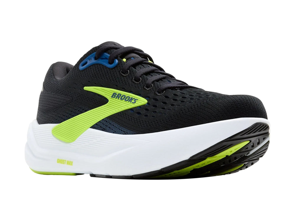 Tenis deportivos Brooks Ghost Max color negro con detalles en verde lima y suela blanca.