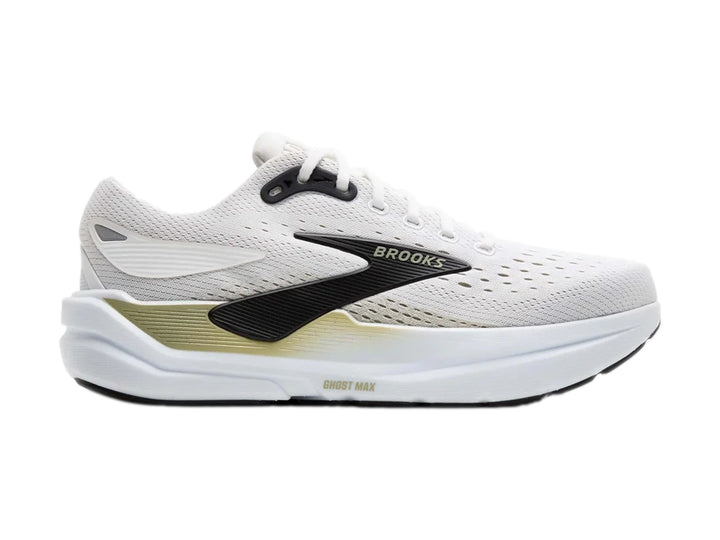 Tenis deportivos Brooks Ghost Max en color blanco con detalles en negro y beige, vista lateral.