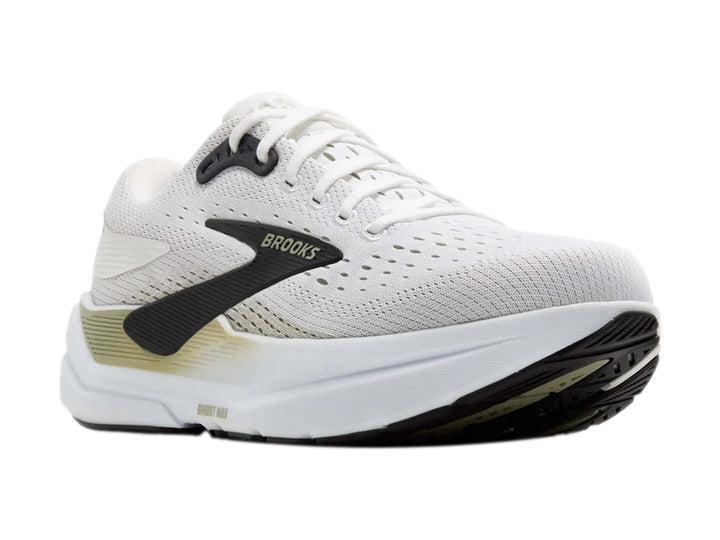 Tenis deportivos Brooks Ghost Max en color blanco con detalles en negro y beige, vista lateral.