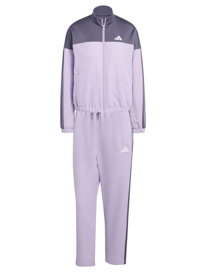Conjunto deportivo Adidas Bold Block en color lila y gris, compuesto por chaqueta y pantalón para mujer.
