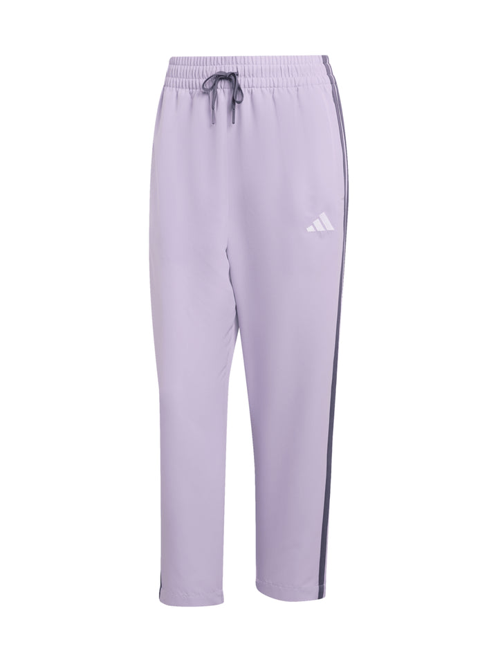 Conjunto deportivo Adidas Bold Block en color lila y gris, compuesto por chaqueta y pantalón para mujer.