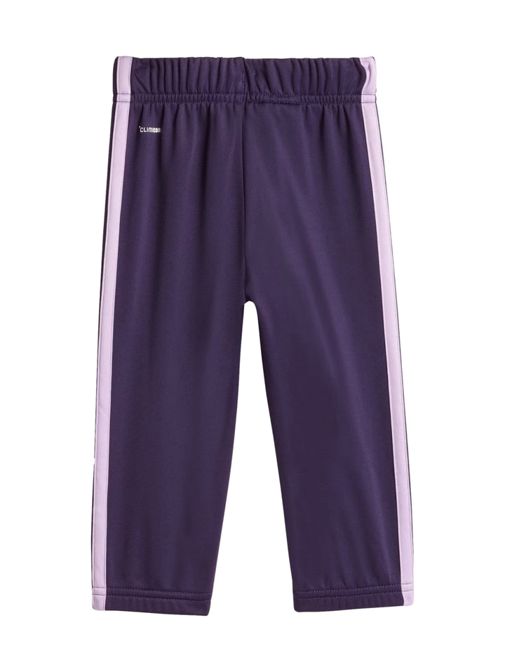 Conjunto deportivo Adidas para niña en color ciruela con franjas laterales en tono lila.