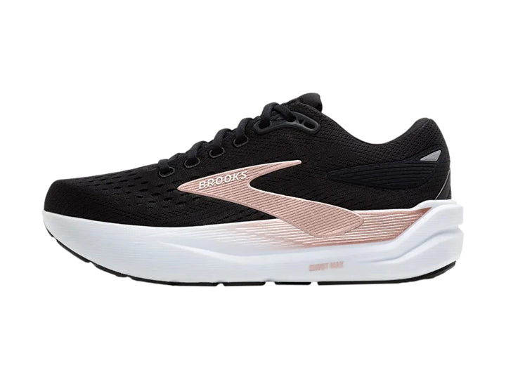 Tenis deportivos Brooks Ghost Max 3 color negro con suela blanca y detalles en oro rosa.