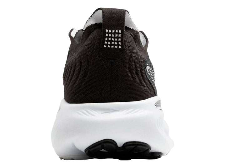 Tenis deportivos Brooks Adrenaline GTS en colores negro, gris y blanco con suela blanca gruesa.