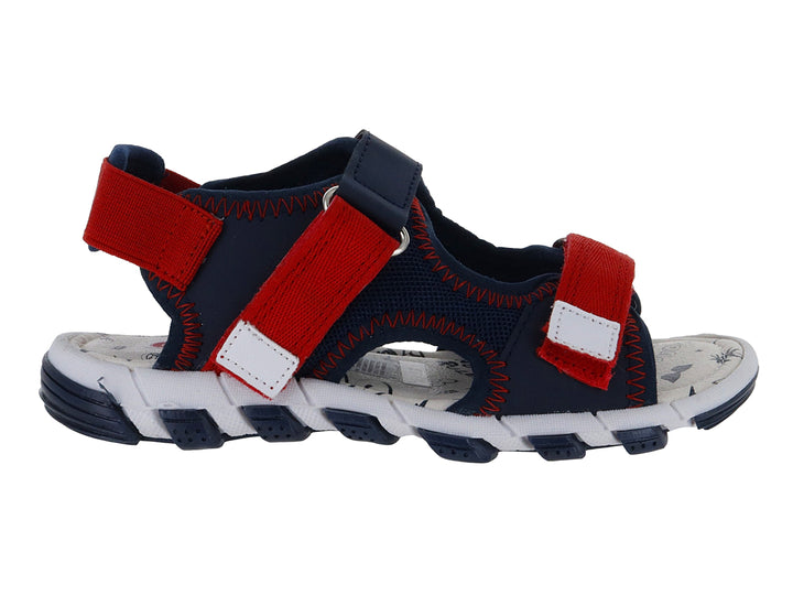 Sandalia infantil Guany en color azul marino y rojo con suela blanca y correas ajustables de velcro.