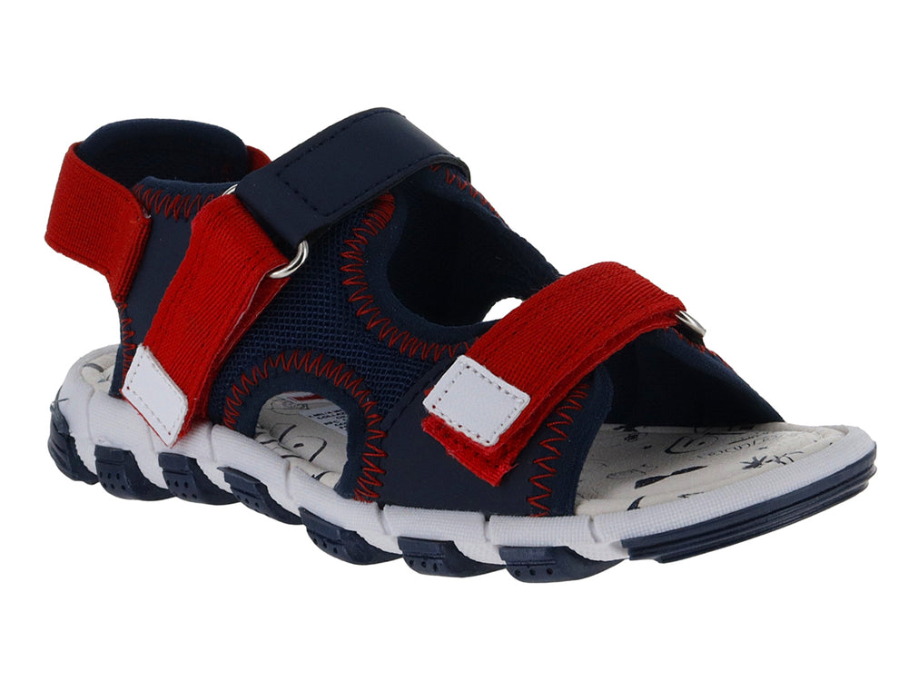 Sandalia infantil Guany en color azul marino y rojo con suela blanca y correas ajustables de velcro.