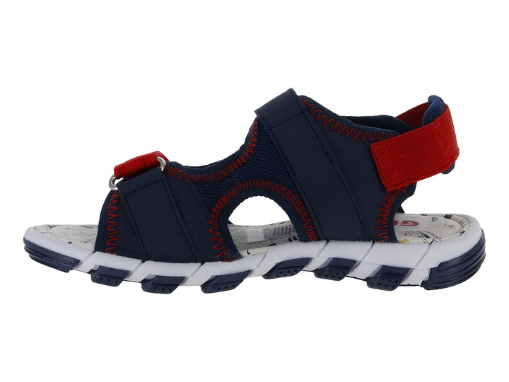 Sandalia infantil Guany en color azul marino y rojo con suela blanca y correas ajustables de velcro.