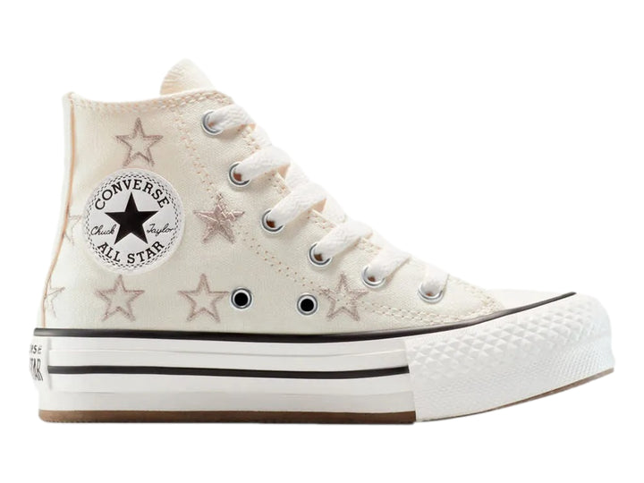 Tenis Converse Chuck Taylor All Star de bota color hueso con estrellas y suela de plataforma blanca.