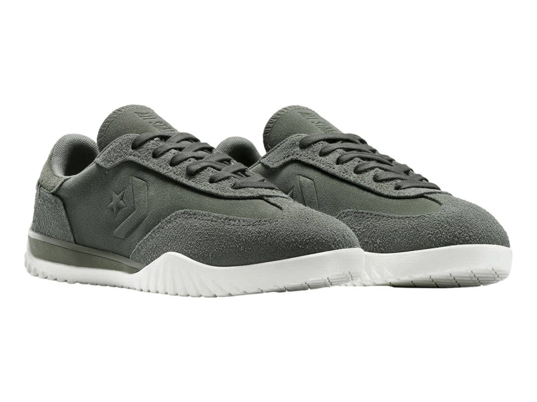 Tenis Converse Run Star Trainer color verde con suela blanca.